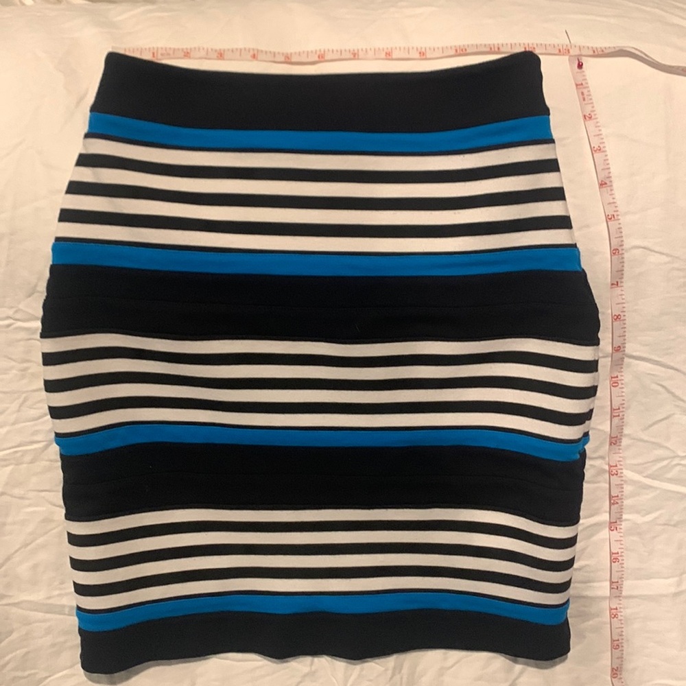 Express Bodycon blue, black, and white mini skirt with hidden side zipper.